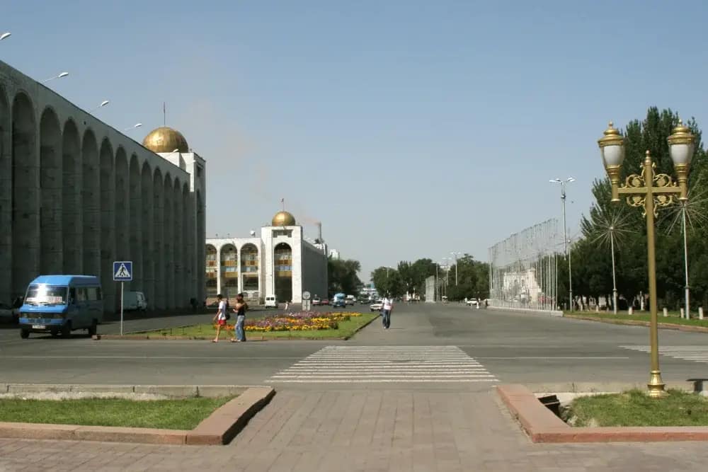 Binance Brings Crypto Payments to Kyrgyzstan 2 Skyline of Bishkek city with modern buildings, symbolizing tech growth.
